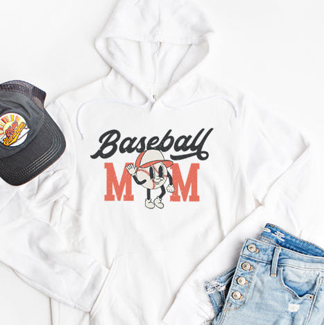 White hoodie with 'Baseball Mom' design, black cap, and denim shorts on a white background