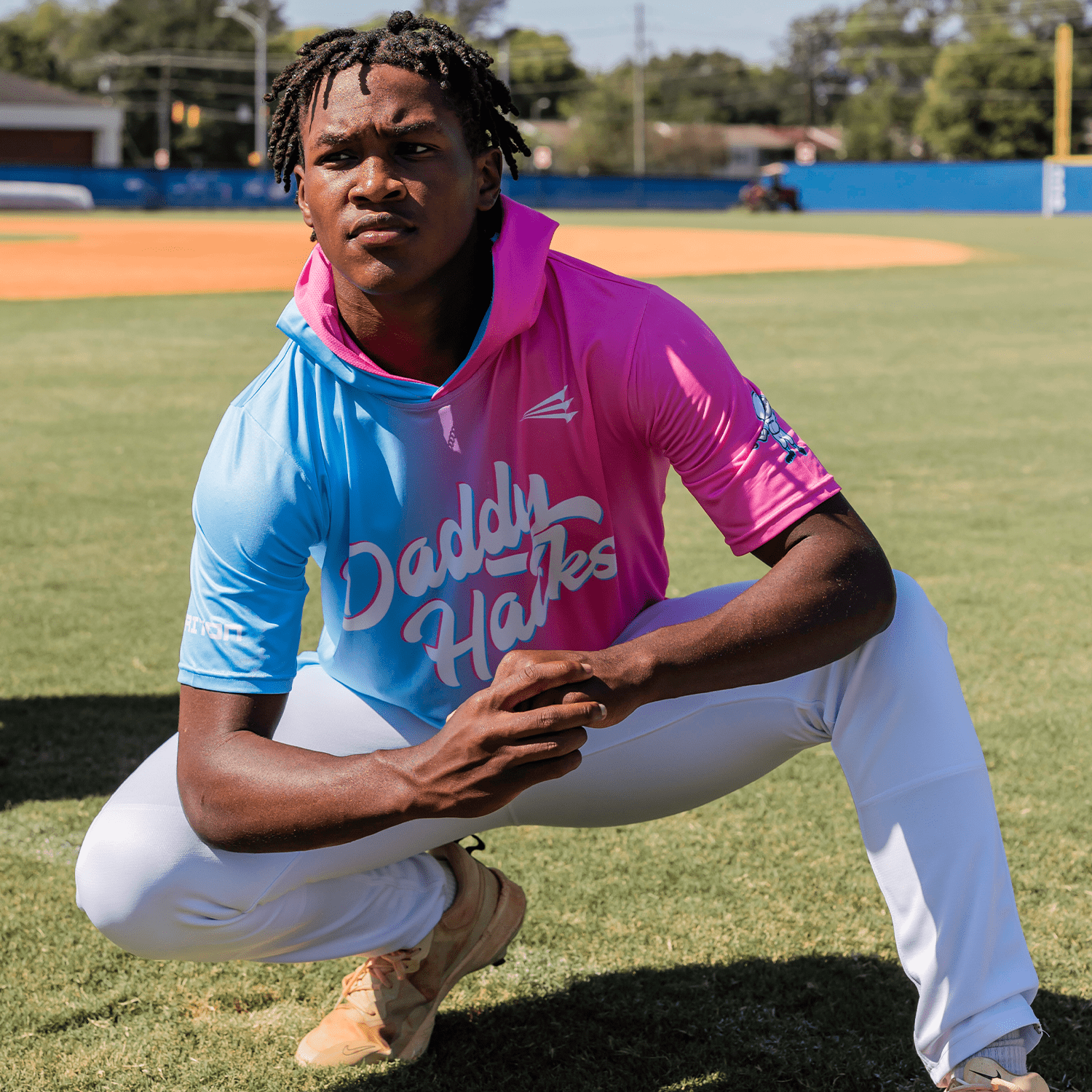 Person wearing a colorful daddy hacks short sleeve baseball hoodie