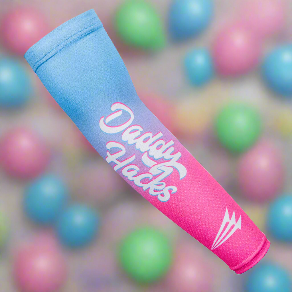 Pink and blue arm sleeve with 'Daddy Hacks' branding on a colorful ball background