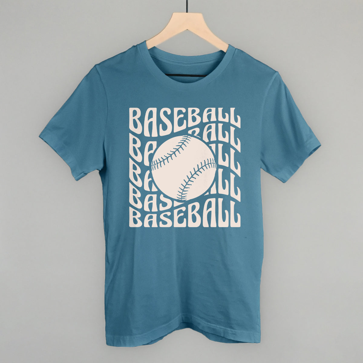 Collection of Blue t-shirt with 'BASEBALL' text and a baseball graphic on a gray background in a gallery layout