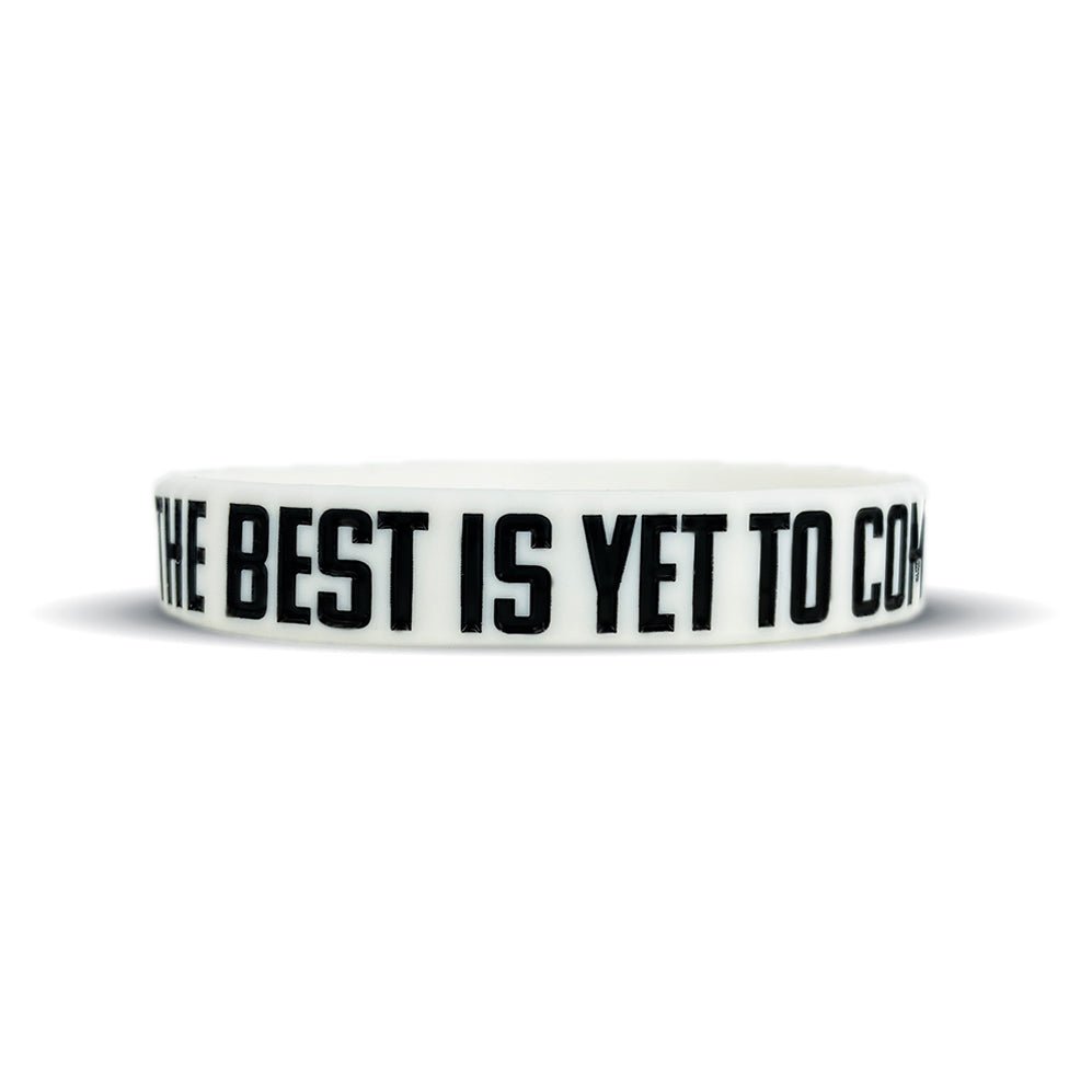 Collection of White wristband with black text 'The Best is Yet to Come' on a white background in a gallery layout