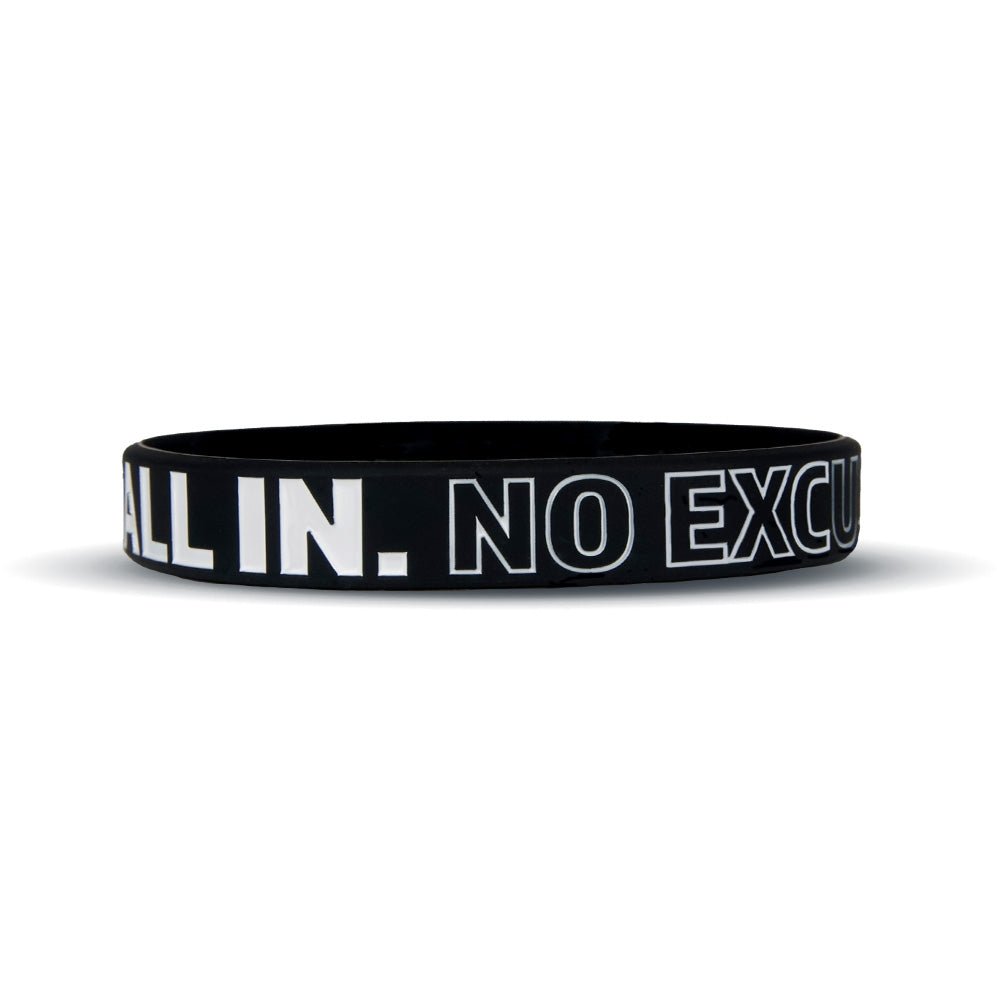 Black wristband with 'ALL IN. NO EXCUSES.' text on a white background