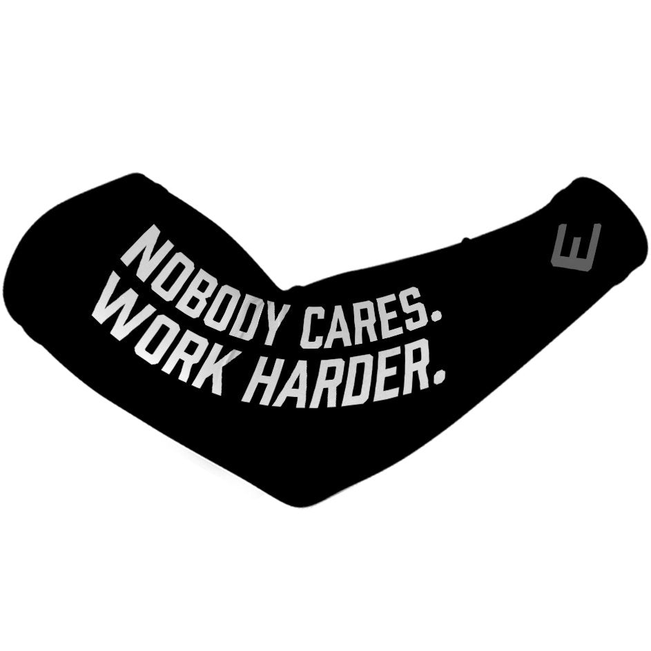 Collection of Black baseball arm sleeve with 'Nobody Cares. Work Harder' text. in a gallery layout