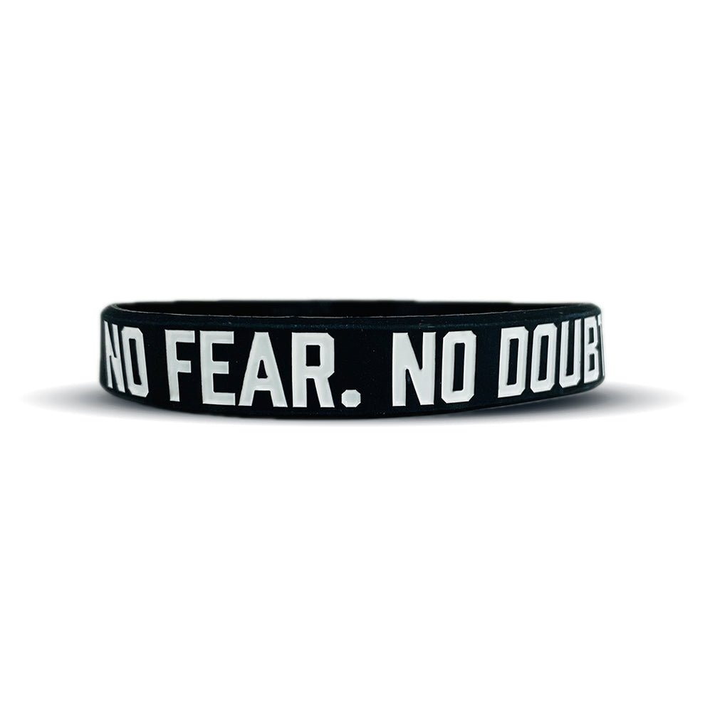 Collection of Black wristband with 'NO FEAR. NO DOUBT.' text on a white background in a gallery layout