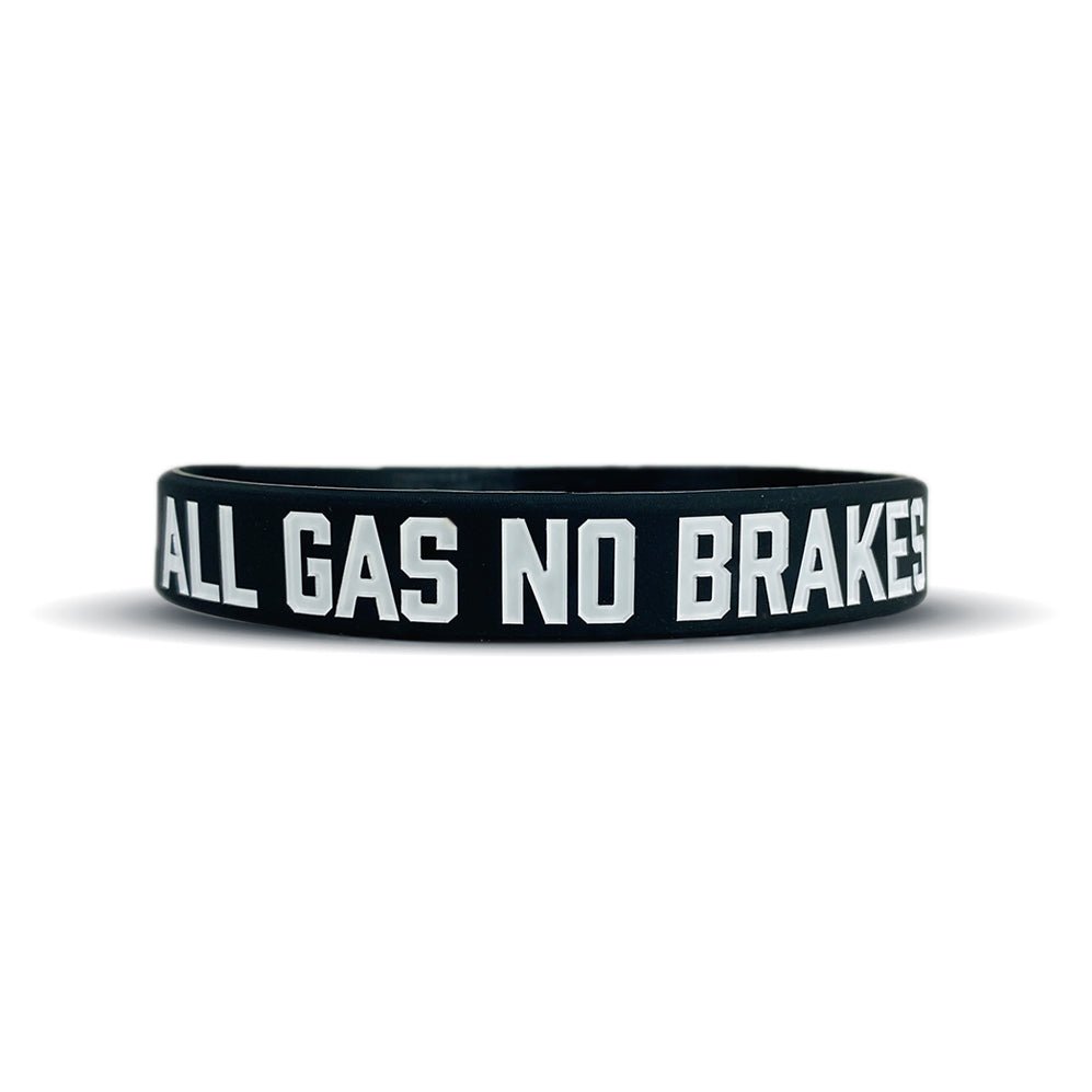 Black wristband with 'All Gas No Brakes' text on a white background